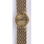 Lady's Patek Philippe Ellipse 18k yellow gold wristwatch Dial: oval gold-tone, applied black Roman