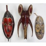 (lot of 3) Ethnographic mask group, including one Papua New Guinea style example, largest: 18.5"h