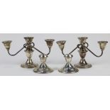 (lot of 4) Pair of weighted sterling silver three-light candelabra with gadrooned accents, each