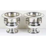 Pair of silver plate champagne coolers, executed in the Georgian taste, the urn form with bead trim,