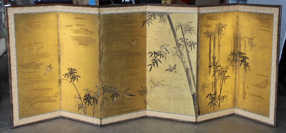 Japanese six-panel screen, Meiji period, depicting bamboo and sparrows in ink and colors on gold