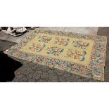 Flatweave floral carpet, 6'9" x 9'11" (torn)