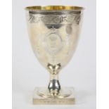 English George III sterling silver goblet, by Hester Bateman, London, 1783,fronted by a stylized