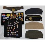 Collection of ephemera including military caps, a belt, and assorted medals and reproduction