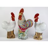 (lot of 3) Chinese porcelain roosters, consisting of a pair of white roosters; together with the