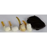 (lot of 4) Smoking pipe group, each carved with composite or bakelite mouth piece, consisting of (2)