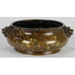 Chinese gold splashed bronze censer, with a compressed body flanked by lion handles, the base with