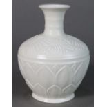 Chinese Ding-type ceramic vase, with a flared neck and a shoulder molded with stylized lotus