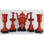 (lot of 5) Chinese cinnabar lacquered associated garniture set, consisting of a censer, pair of