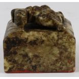 Chinese hardstone seal, topped with a mythical beast above a square seal, the underside with four