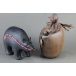 (lot of 2) Native American style decorative art including a figure of a bear and a stylized seated