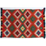 Navajo Germantown "eyedazzler" blanket, circa 1900, with vibrant diamond patterning in green, red,