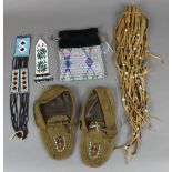 Native American beaded and tassel leather pouch, 24"l