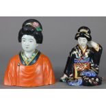 (lot of 2) Japanese porcelain Kutani figures: one seated geisha in black kimono, her left hand