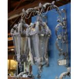 (lot of 4) Rococo style light blue painted wall lanterns, each having acanthus accents, 36"h