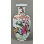 Chinese enameled porcelain vase, with an everted rim and slender neck above an ovoid body, decorated