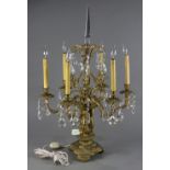 Louis XV style candelabra, mounted as a table lamp, having six lights, centered with a prism finial,