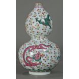 Chinese enameled porcelain vase, of double gourd form with five dragons amid colored clouds, base