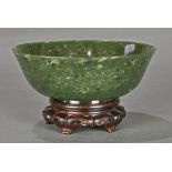 Chinese spinach jade bowl, with a wide flared mouth and shallow body raised on low splayed foot, 6.