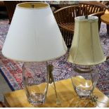 (lot of 2) Simon Pearce glass table lamps, each having a cream shade above a clear glass body,