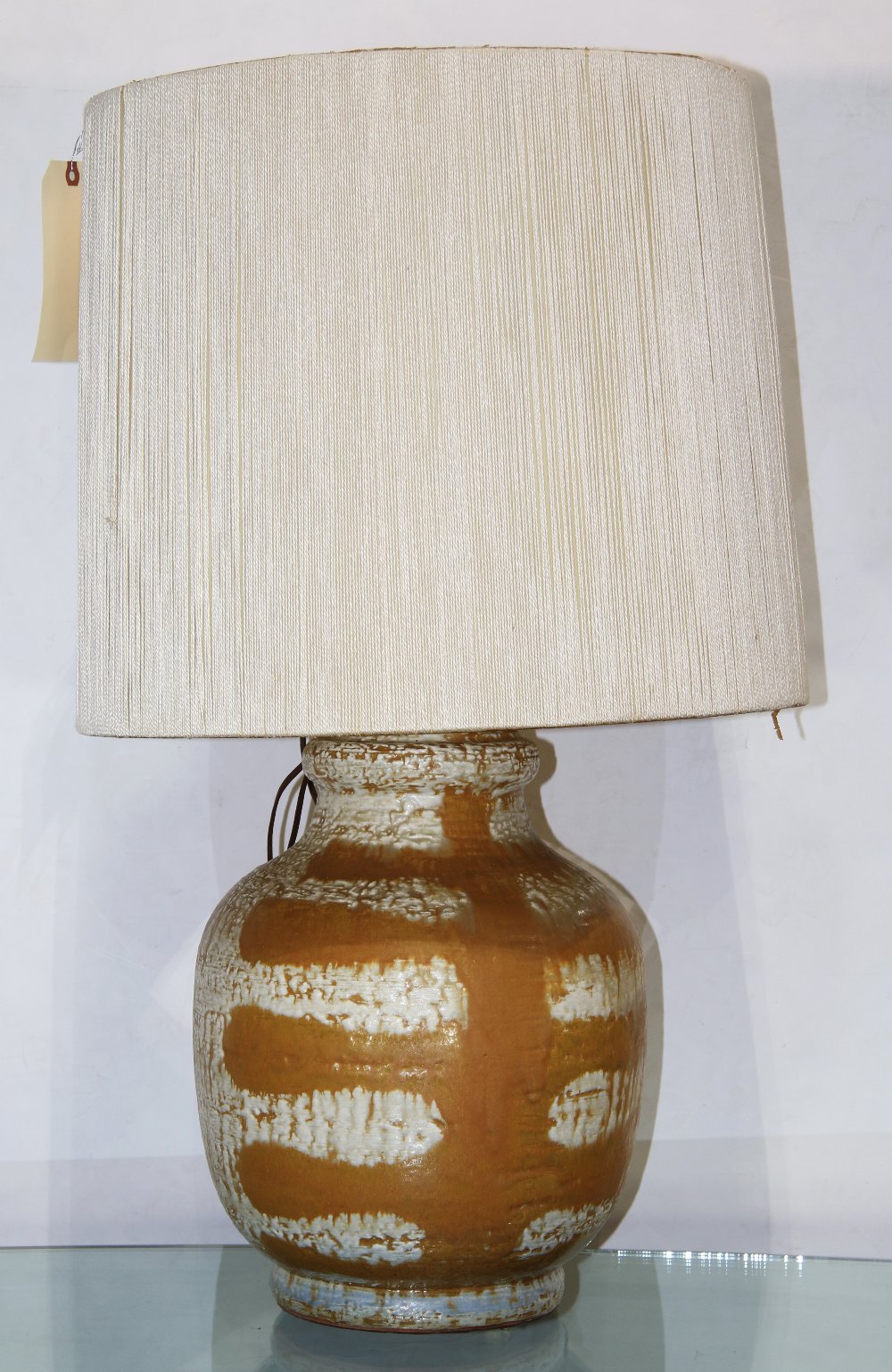 Mid-century, Design-Technics (Lee Rosen design) ceramic table lamp, circa 1950, having a cream