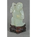 Chinese jade figural carving, in the form of a Daoist priest holding a whisk to the right hand, 2.