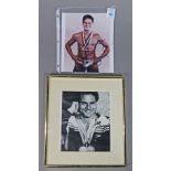 (lot of 2) Autographed Olympic athlete photographs, bearing the signature of Greg Louganis, largest: