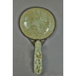 Chinese jade mounted hand mirror, with a celadon domed plaque carved with an attendant rowing a raft