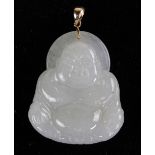 Jadeite and 14k yellow gold Buddha pendant the carved jadeite plaque, measures approximately 39 x 33