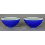 Chinese blue glazed porcelain bowls, of inverted bell form with an apocryphal Yongzheng mark to