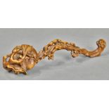 Chinese boxwood ruyi scepter, the gnarled branch carved with persimmons, 8.5"w