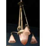 French Art Deco art glass chandelier, having a patinated support with floral accents surmounting the