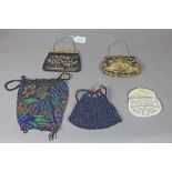 (lot of 5) Group of beaded and embroidered purses, some having polychrome floral decoration,