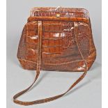 Vintage purse in brown with handle, marked "I. Magnin, made in Italy", 9"h