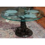 Continental style patinated bronze low table, having a plate glass etched rose bush decorated top