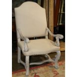Continetnal baroque-style armchair, having a shaped back, the wood frame painted dove grey, rising