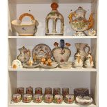 Three Shelves of Spanish Talavera ceramic table articles, consisting of cups, saucers, cruets, a