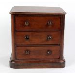 Salesman Sample three drawer chest, the beveled molded rectangular top above three drawers, the
