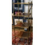 English Regency style etagere, having 4 leather clad shelves and brass supports, rising on