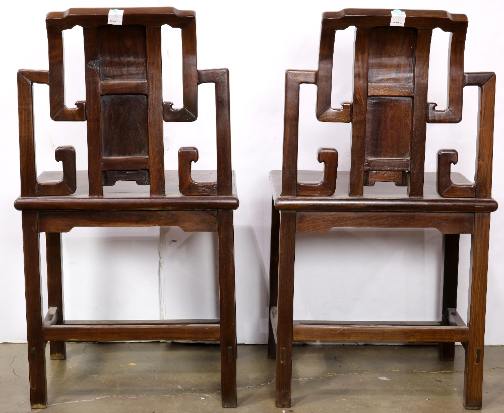 Pair of Chinese wooden side chairs, the stepped back inset with a panel carved with peaches, the - Image 2 of 4