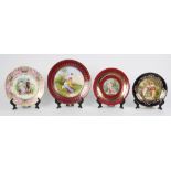 (lot of 4) Royal Vienna-style porcelain plates, each with parcel gilt decorated borders