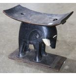 Ashanti stool, Ghana, having a carved elephant figural base, 19"h x 21"w x 11"d