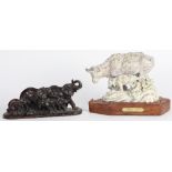 (lot of 2) Cast metal sculpture group, consists of a patinated bronze elephant sculpture depicting