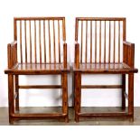 Pair of Chinese wooden armchairs, the meigui yi with railed back splat and arms, the rectangular