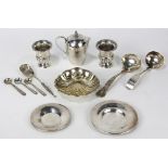 (Lot of 12) American sterling silver table articles, comprising a pair of sterling miniature urn-