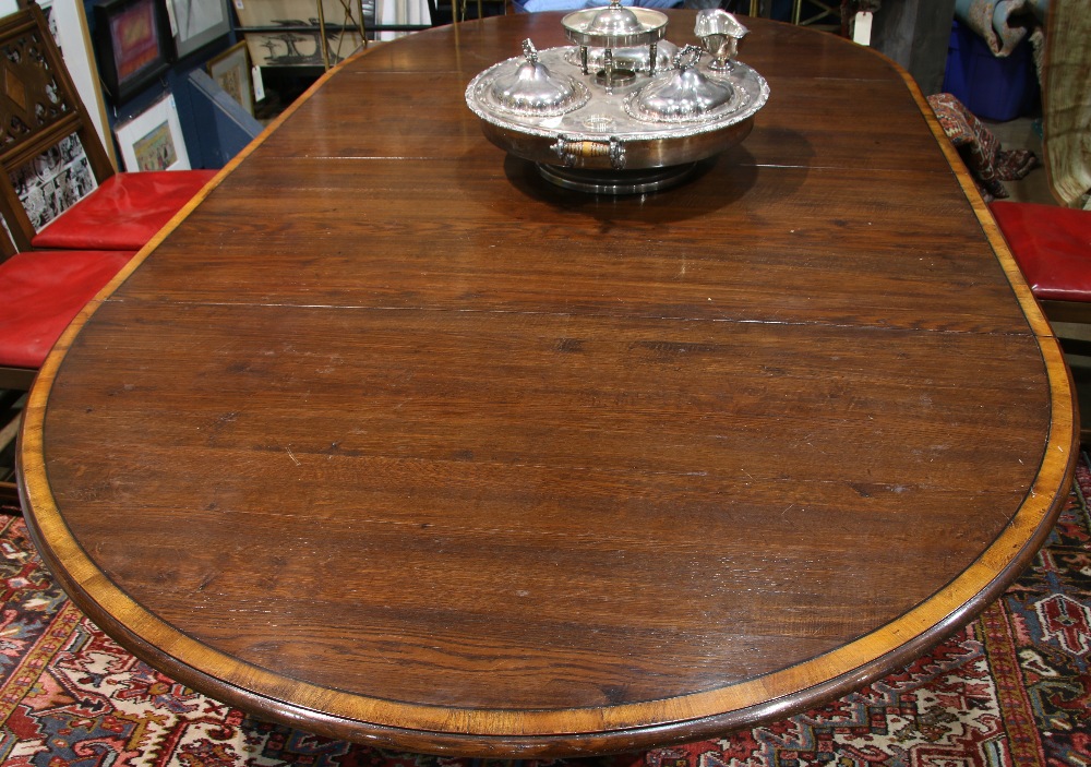 English George III style mahogany dining table, having a circular top with inlaid banding, two 24" - Image 2 of 2