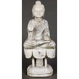 Chinese stone Buddha, in abhaya and varada mudra, seated on a lotus pedestal, executed from a