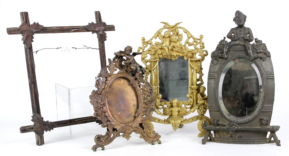 (lot of 4) Contintental frame group, consisting of an oval form vanity mirror, surmounted by a