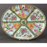 Chinese rose medallion porcelain charger, of oval form with figural and bird-flower reserves, 18"w