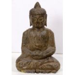 Chinese stone Buddha, seated in dyanasana holding a jewel in hand, 7.5"h